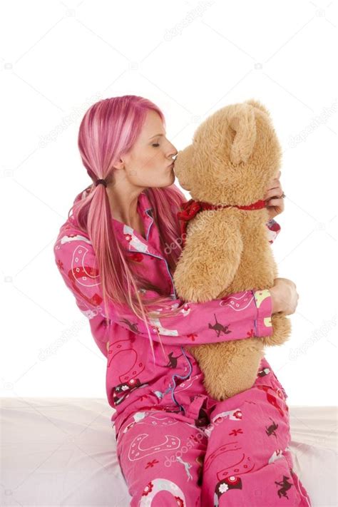 Woman Pink Pajamas Kiss Stuffed Animal Bear Stock Photo By ©alanpoulson