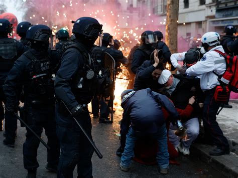 clashes in paris as hundreds of thousands across france march against plan to raise retirement