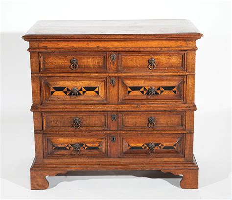 A chest of drawers, also called (especially in north american english) a dresser or a bureau, is a type of cabinet (a piece of furniture) that has multiple parallel, horizontal drawers generally stacked one above another. James II oak chest of drawers, with four long drawers, the ...