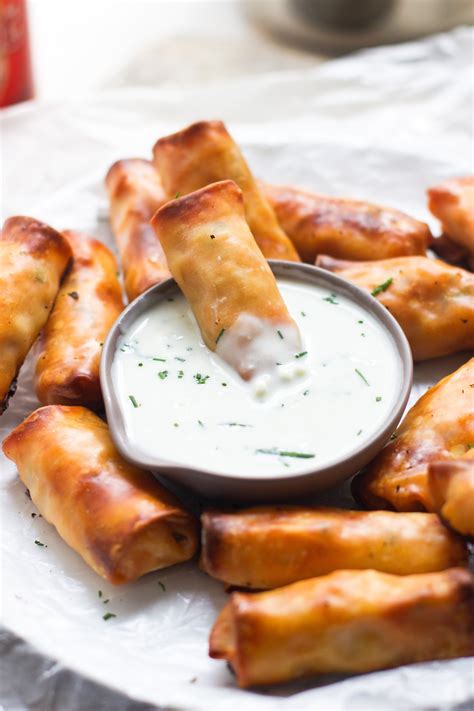Place 2 chicken pieces on each plate. Baked Mini Buffalo Chicken Egg Rolls with Blue Cheese ...