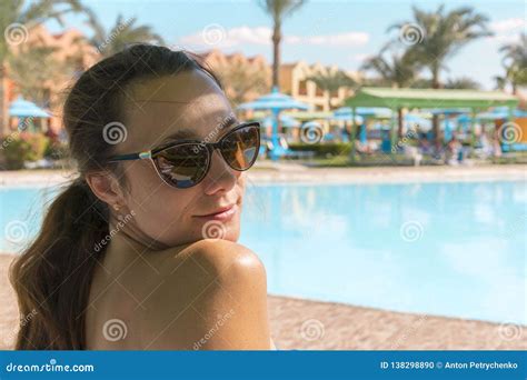 Beautiful Woman In Sunglasses By The Pool Colorful Portrait Of Young Attractive Woman Wearing