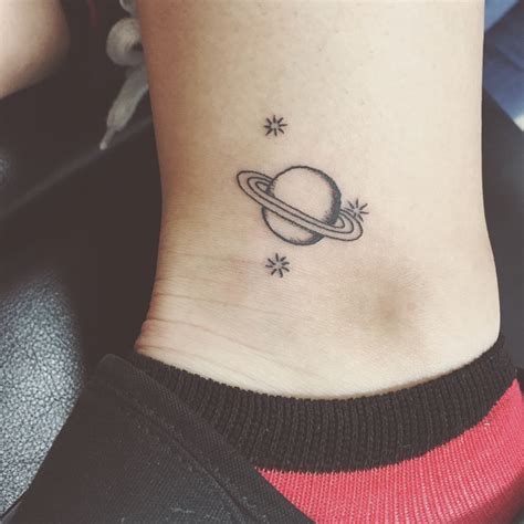 Tiny Saturn Tattoo Done By Mike Garcia At Arlington Ink Saturn Tattoo