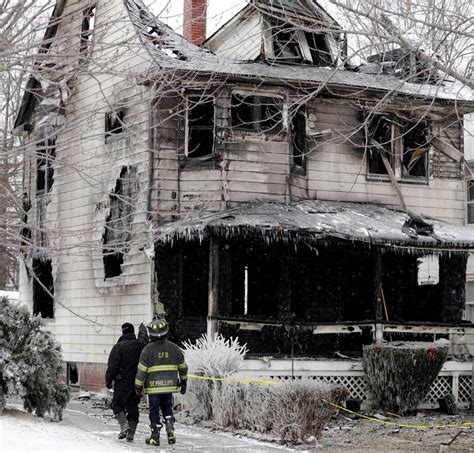 Cleveland House Fire Woman Jumps From Window 2 Kids Missing