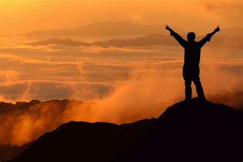 Premium Photo Silhouette Man Standing On Mountain Against Sky During