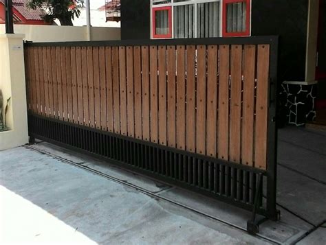 0812 2473 9625 silahkan saja langsung pesan pada kami : pintu pagar besi kayu terbaru I Bengkellas