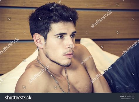 photo de stock shirtless sexy male model lying alone 344711189 shutterstock