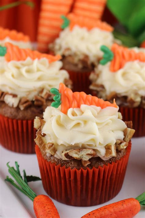 With a hint of cinnamon, soft crunch from nuts, ultra moist crumb and piled high with the fluffiest ever cream cheese frosting, this has the perfect texture and flavour. Carrot Cake Cupcakes - Two Sisters
