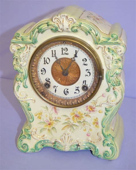 This is oak and is referred to as a kitchen gingerbread clock. Ansonia "Chemung" Porcelain Shelf Clock Price Guide