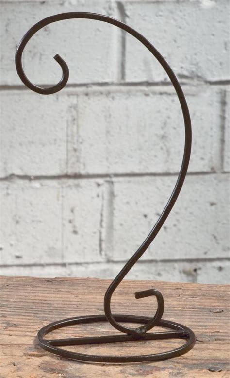 It is part of the iron series. Ornament Hanger - 1 Ornament - Black - Up to 7.25in Ornament
