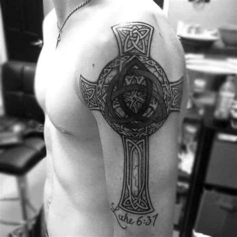 The great thing about irish tattoos is that they are colorful and usually with a spiritual element to it. 100 Celtic Cross Tattoos For Men - Ancient Symbol Design Ideas