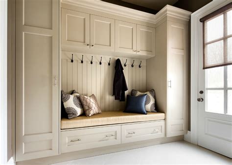 The garage is a perfect place to store items like shoes and raincoats. Mastering the messy mudroom! | EiEiHome