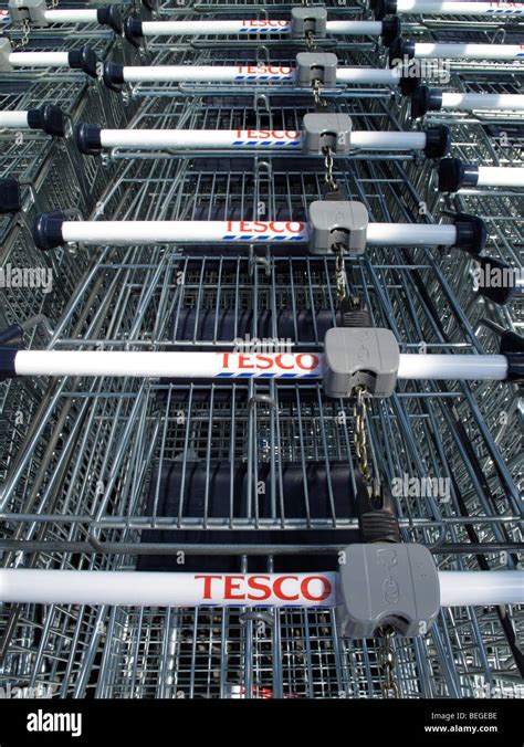 Shopping Trolleys Or Carts For A Tesco Supermarket Stock Photo Alamy