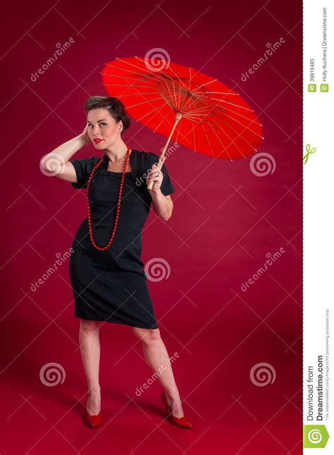 Pinup Girl Poses With Red Umbrella Stock Image Image Of Hair Indoors