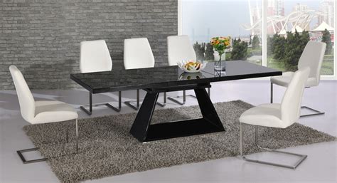 Arm chairs—perfect for both casual and formal occasions, arm chairs elevate the image of your dining table. Extending Black glass high gloss dining table and 8 white ...