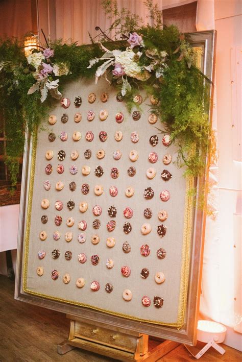 elegant chicago wedding with an amazing donut wall wedding donuts donut wall wedding donut wall