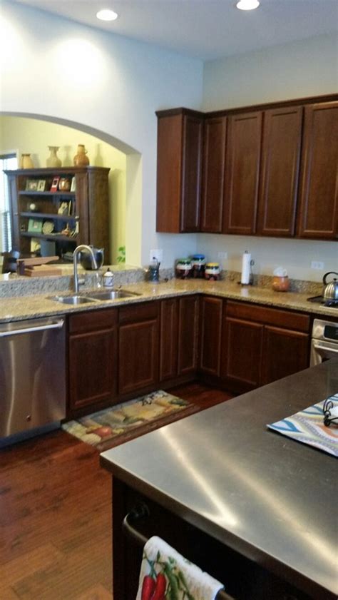 Cherry kitchen cabinets wall color, how they look and see. I have a kitchen with dark cherry cabinets and dark cherry ...