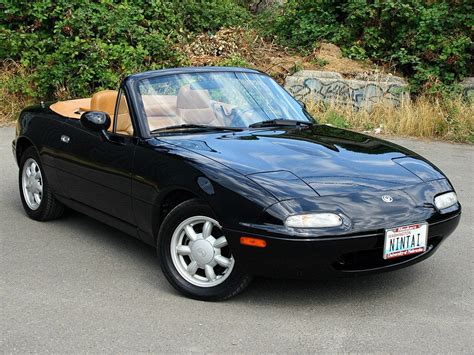 Every used car for sale comes with a free carfax report. How much is this '93 Miata worth? (description inside) : Miata
