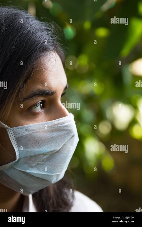 An Indian Girl Wearing A Face Mask During Covid 19 Pandemic As The Lock