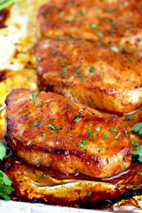 Oven oven baked pork chops covered in brown sugar and garlic on a sheet pan with yukon potatoes. Baked Pork Chops on a sheet pan. | Boneless pork chop recipes, Easy pork chop recipes, Easy ...