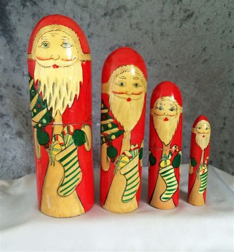 My name is irina lyamshina. Vintage Hand Painted Santas Christmas Nesting Dolls ...
