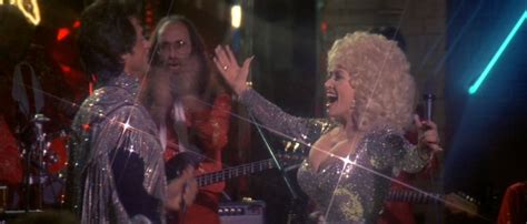 dolly parton showing off her huge tits in rhinestone dolly parton tits huge rhinestone