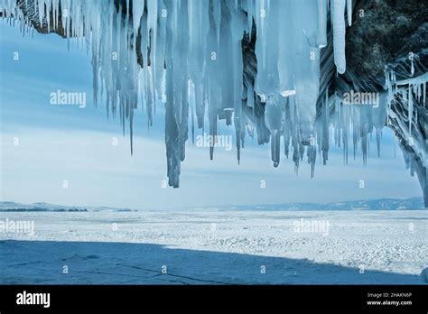 Inside The Ice Cave With Icicles On The Lake Baikal In Winter Siberia