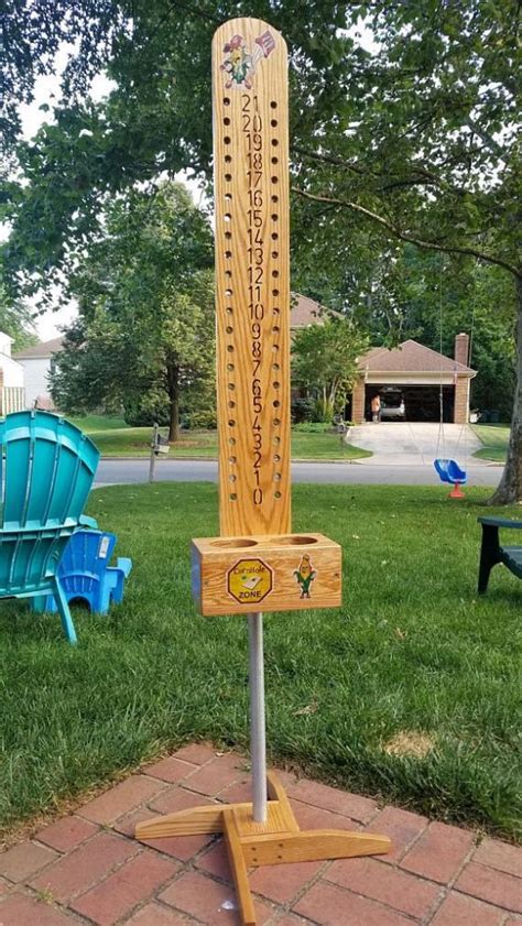 Cornhole Scoreboard Made Out Of Wood Includes Drink Holders Attached