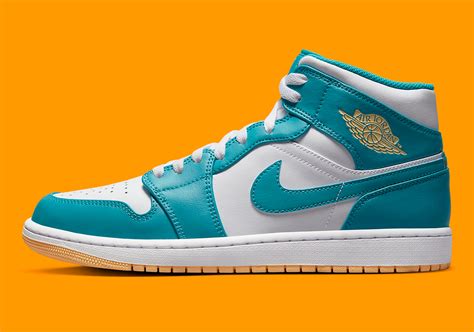 The Womens Air Jordan 1 Mid Brightens Up With Aqua And Peach Tones