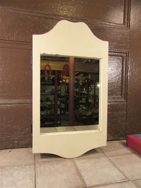 It features the look of an upscale framed mirror, is handmade from real wood, and sits closer to the wall than any other medicine. Reduced...Old white painted wood medicine cabinet wall ...