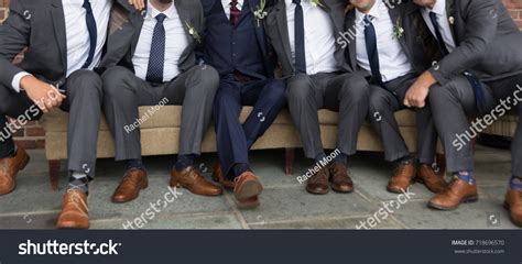 Groom Groomsmen Sitting On Sofa Stock Photo 718696570 Shutterstock