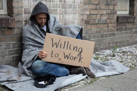 343 Homeless Man Holding Cardboard Sign Stock Photos Free And Royalty