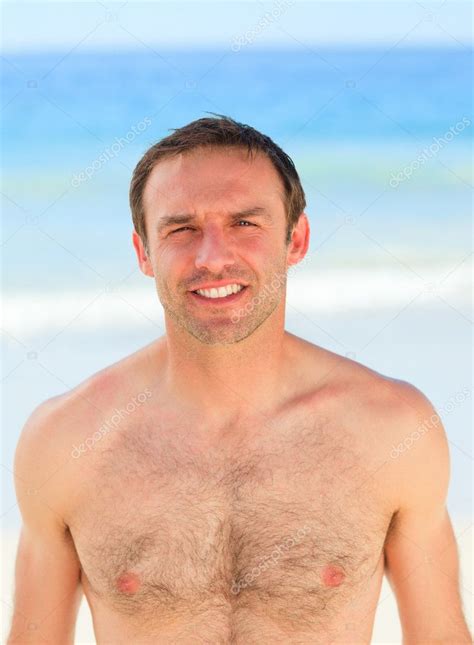 Handsome Man On The Beach Stock Photo By ©wavebreakmedia 10851716