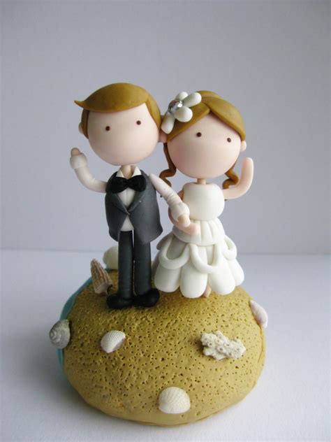Stun guests with a fabulous wedding cake topped with a customizable wedding cake topper that's a miniature version of you, carefully hand painted and lovingly detailed only by couplesoncakes. Wedding Clay Cake Topper - Beach Theme (Not Edible) on Luulla
