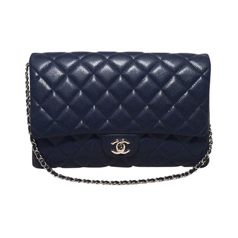 The realreal is the world's #1 luxury consignment online store. Chanel NWOT Navy Blue Classic Caviar Clutch with Chain ...