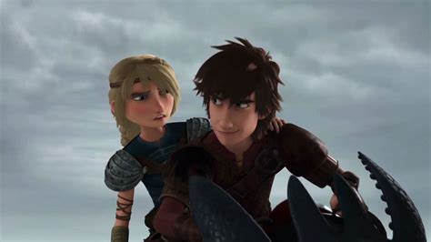 hiccup and astrid riding on toothless s back together from dreamworks dragons race to the edge