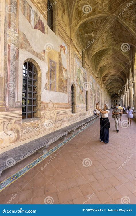 cloister santa chiara view of corridor under arcades and decorated colorful frescoes naples
