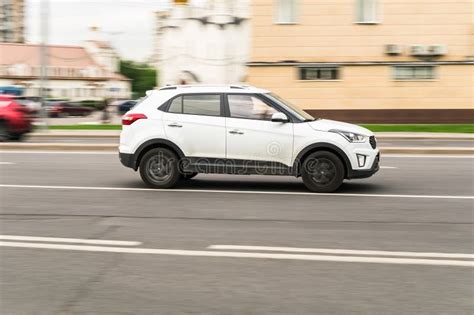 White Korean Compact Crossover Hyundai Creta On The City Road Fast