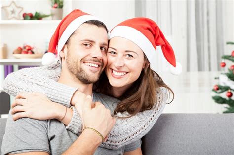 Young Happy Couple Hug And Love Christmas Stock Photo