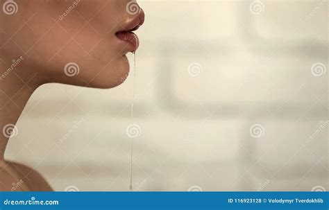 Part Of Female Face With Saliva Drool From Mouth Stock Photo Image Of