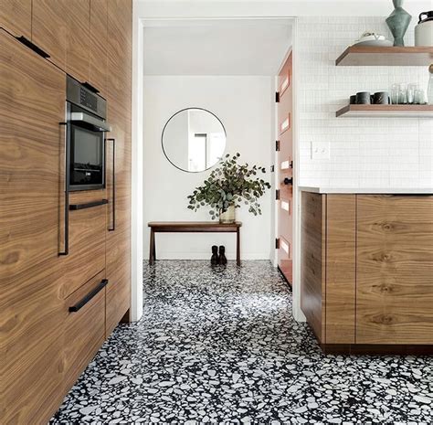 The countertops are blue lagos ceasarstone. Pin by John McHugh on 2345 | Contemporary wood kitchen, Terrazzo flooring, Contemporary kitchen ...