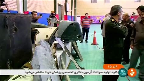 A page for describing funny: Iranian TV shows 'debris' of downed US drone - YouTube