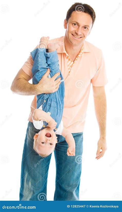 Father Holding His Baby Upside Down Stock Image Image Of Happy