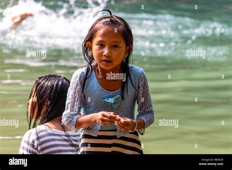 Thakhek Laos April Well Dressed Local Girl Looking At The Camera And Surrounded By