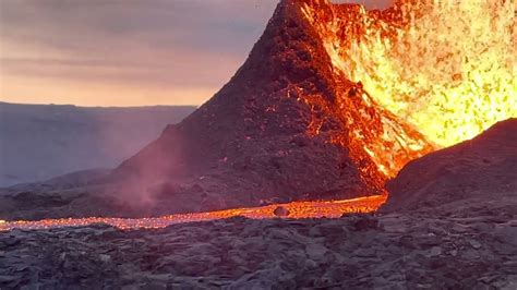 Lava Tornado Rises Out Of Rocky Ground While Volcano Erupts In Iceland