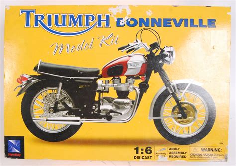 A New Ray 16 Triumph Bonneville Diecast Model Kit Contents Unchecked