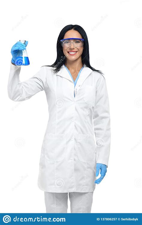 Young Beautiful Chemist Working With Dangerous Liquids