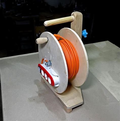 Maybe you would like to learn more about one of these? Extension Cable Reel Making - Video & PDF in 2021 | Woodworking projects diy, Cable reel, Diy ...