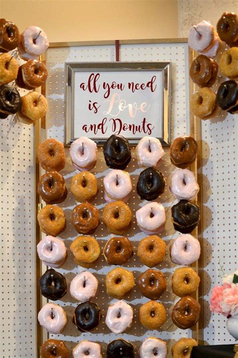 30 best wedding donut walls and displays for 2021 wedding donuts donut wall wedding dessert table