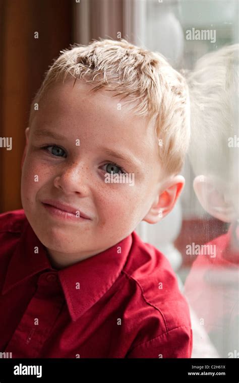 Thoughtful 7 Year Old Boy At His Home Stock Photo Alamy