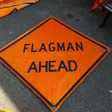 Flagman Ahead Sign Tramps Prop Hire